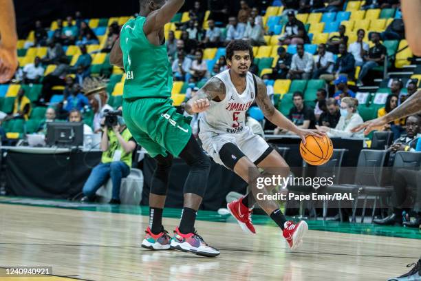 Edgar Sosa of the Zamalek dribbles the ball during the game against the Forces Armeés et Police Basketball on May 27, 2022 at the Kigali Arena. NOTE...