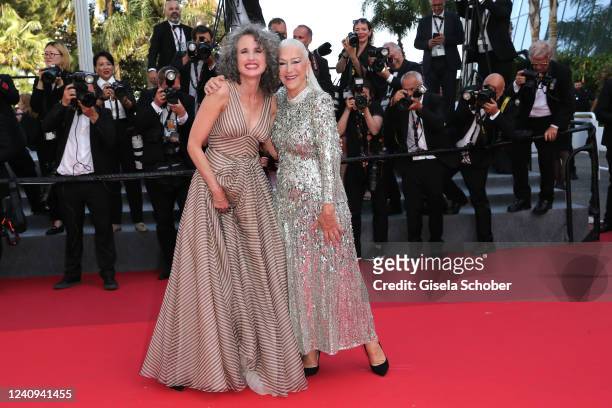 Andie MacDowell and Helen Mirren dance during the screening of "Mother And Son " during the 75th annual Cannes film festival at Palais des Festivals...