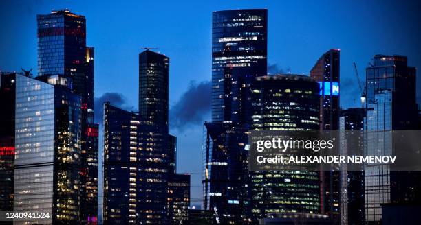 Picture taken on May 27, 2022 shows a view of the towers of the International Business Centre in western Moscow. Russia's central bank cuts its key...