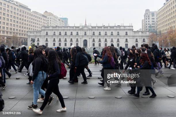 Students march outside the Palacio de La Moneda -government house-, demanding improvements in education, in Santiago on May 27, 2022.