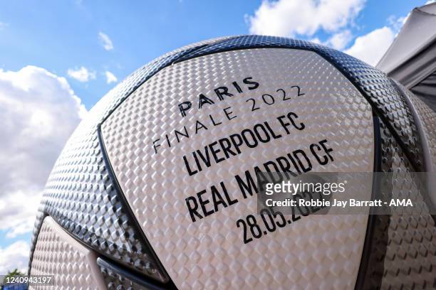 Giant UEFA Champions League Paris Finale 2022 replica match ball with the match fixture on ahead of a Liverpool FC Training Session at Stade de...