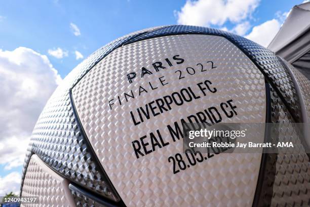 Giant UEFA Champions League Paris Finale 2022 replica match ball with the match fixture on ahead of a Liverpool FC Training Session at Stade de...