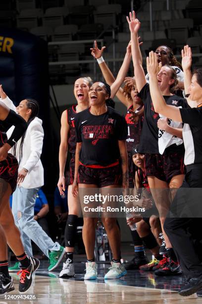 The Indiana Fever celebrates during the game against the Los Angeles Sparks on May 27, 2022 at Indiana Famers Coliseum, in Indianapolis, Indiana....