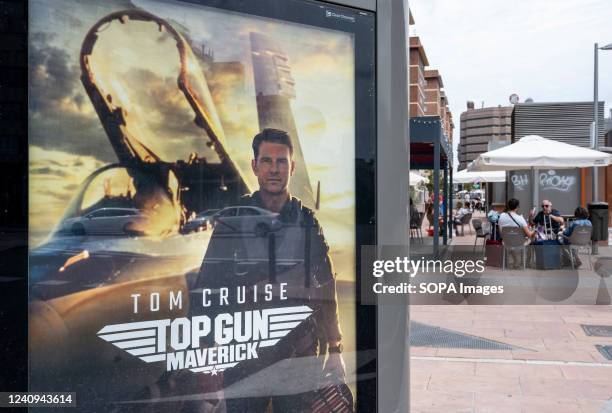 Street commercial advertisement poster from Paramount Pictures featuring Top Gun Maverick movie and American actor Tom Cruise in Spain.