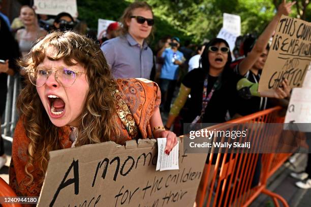 Houston, Texas May 27, 2022- Protestors shout outside the George R. Brown Convention Center in Houston Friday as the NRA Convention is held a few...
