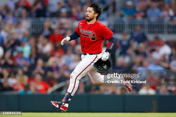 Travis d'Arnaud of the Atlanta Braves races to second for a double during the fifth inning against the Miami Marlins at Truist Park on May 27, 2022...