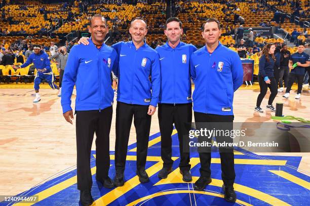 Referees Eric Lewis, Kane Fitzgerald, Ben Taylor, and Brian Forte pose for a photo before Game 2 of the 2022 NBA Playoffs Western Conference Finals...