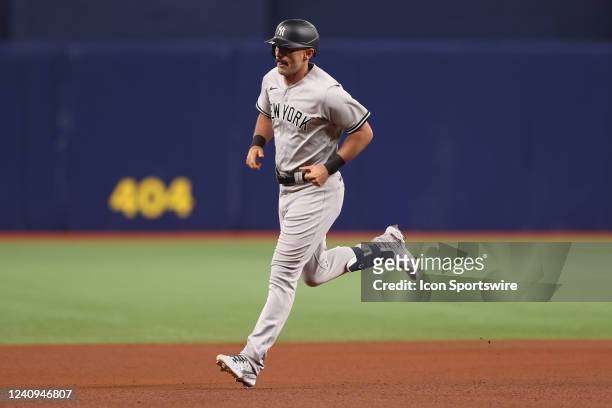 New York Yankees second baseman Matt Carpenter rounds the bases after hitting a solo home run during the MLB regular season game between the New York...