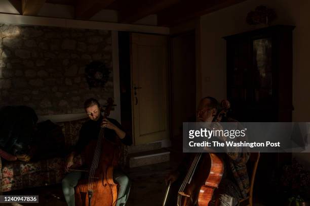 Claudio Ronco renowned cellist, and his wife Emanuela Vozza, also renowned cellist, portrayed playing the cello in their house in Osigo, a small town...
