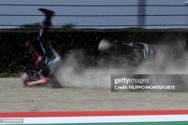 Gresini Racing Ducati's Italian rider Enea Bastianini falls during free practice 3 ahead the Italian Moto GP Grand Prix at the Mugello race track,...