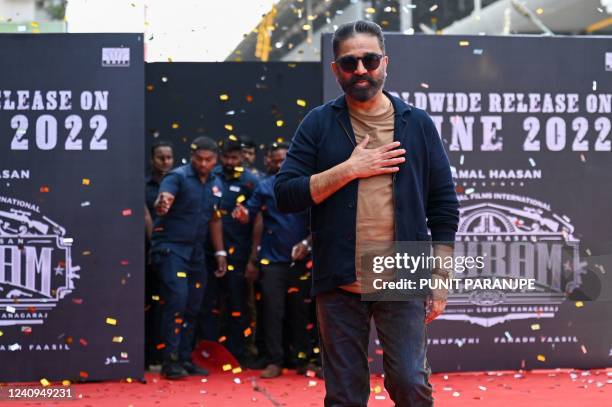 Bollywood actor Kamal Haasan gestures as he arrives to promote his new film Vikram in Mumbai on May 28, 2022.