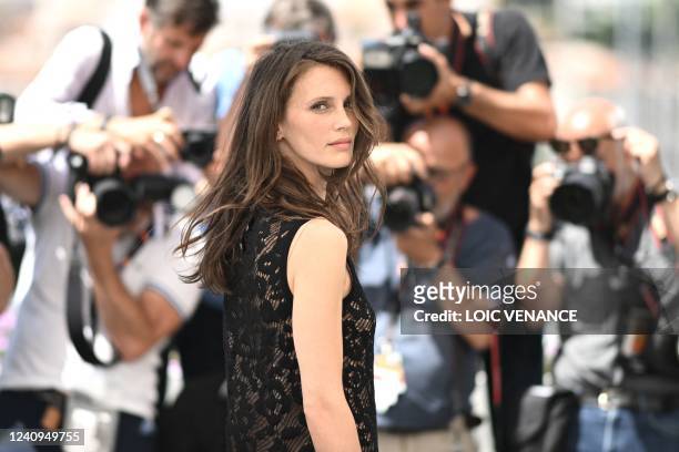 French actress Marine Vacth attends a photocall for the film "Mascarade" during the 75th edition of the Cannes Film Festival in Cannes, southern...