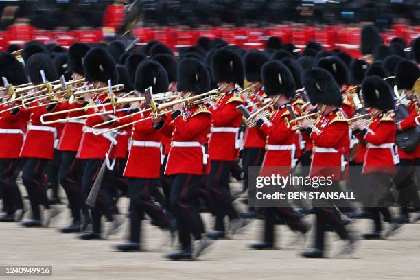 The Band of the Grenadier Guards march across the parade ground during the Colonel's Review at Horse Guards Parade in London on May 28, 2022. The...