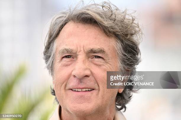 French actor Francois Cluzet poses during a photocall for the film "Mascarade" at the 75th edition of the Cannes Film Festival in Cannes, southern...