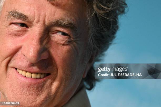 French actor Francois Cluzet smiles during a press conference for the film "Mascarade" at the 75th edition of the Cannes Film Festival in Cannes,...