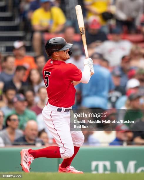 Enrique Hernández of the Boston Red Sox hits an rbi double during the second inning of a game against the Baltimore Orioles on May 28, 2022 at Fenway...