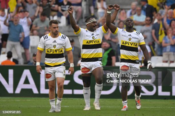 La Rochelle's French wing Artur Retiere celebrates with teammates after scoring during the European Rugby Champions Cup, rugby union final between...