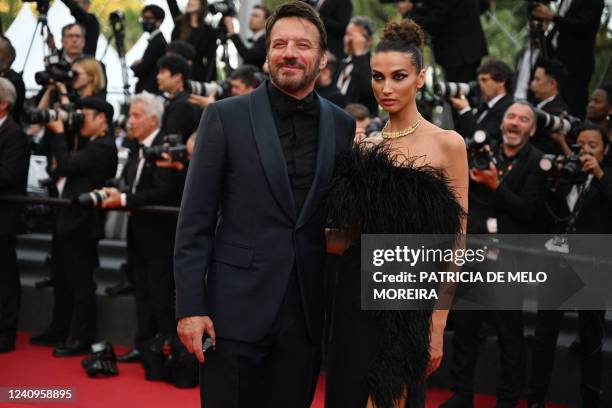 French actor and member of the Camera d'or jury Samuel Le Bihan and Romanian actress and model Stefania Cristian arrive for the Closing Ceremony of...