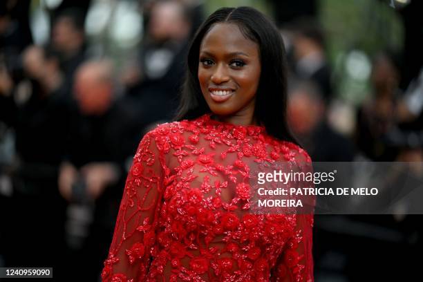French director Maimouna Doucoure arrives for the Closing Ceremony of the 75th edition of the Cannes Film Festival in Cannes, southern France, on May...