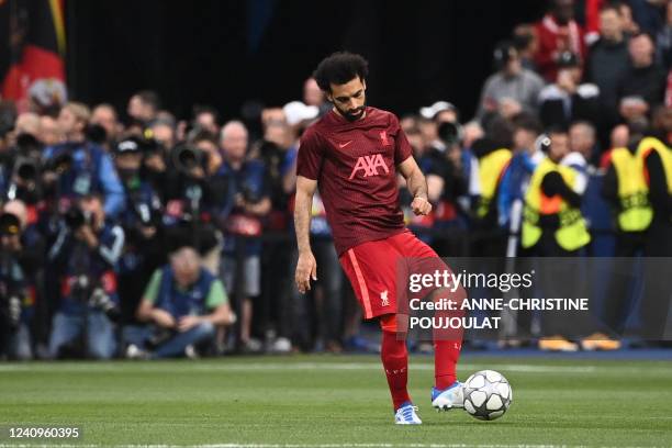 Liverpool's Egyptian midfielder Mohamed Salah warms up prior to the UEFA Champions League final football match between Liverpool and Real Madrid at...
