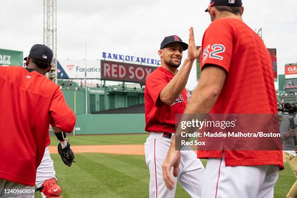 Nathan Eovaldi of the Boston Red Sox reacts with Michael Wacha of the Boston Red Sox after throwing a complete game in game one of a doubleheader...