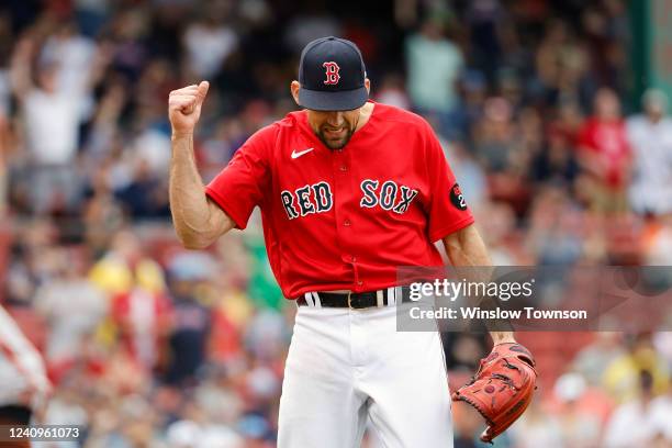 Pitcher Nathan Eovaldi of the Boston Red Sox pumps his fist after the final out of their 5-3 win over the Baltimore Orioles in game one of a...