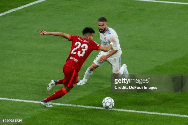 Luis Diaz of Liverpool FC and Dani Carvajal of Real Madrid battle for the ball during the UEFA Champions League final match between Liverpool FC and...