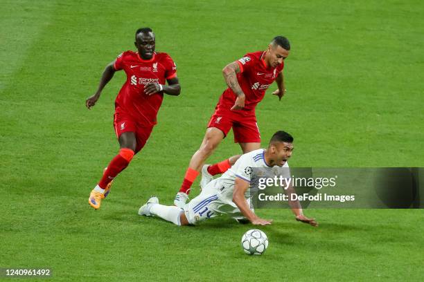 Sadio Mane of Liverpool FC, Thiago Alcantara of Liverpool FC and Casemiro of Real Madrid battle for the ball during the UEFA Champions League final...