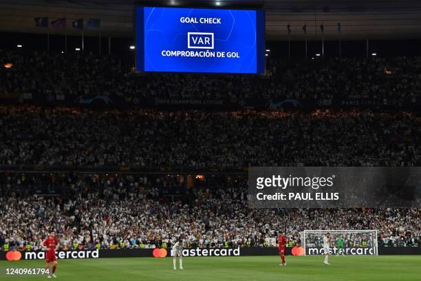 Real Madrid's French striker Karim Benzema's goal is checked on VAR after being declared offside during the UEFA Champions League final football...