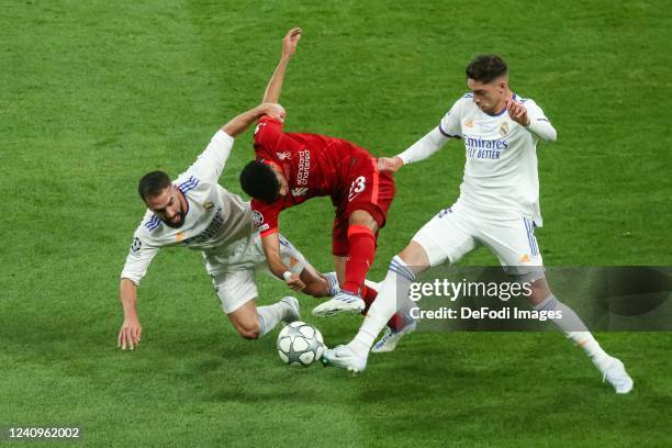 Dani Carvajal of Real Madrid, Luis Diaz of Liverpool FC and Federico Valverde of Real Madrid battle for the ball during the UEFA Champions League...