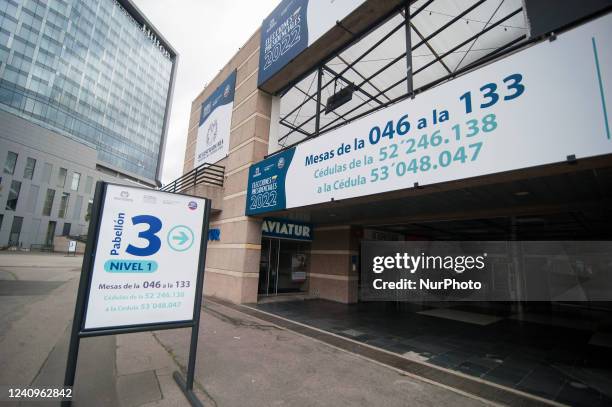 Sign that indicates the voting place numbers and identifications allowed to vote at the Corferias fair compund for the 2022 Presidential Elections in...