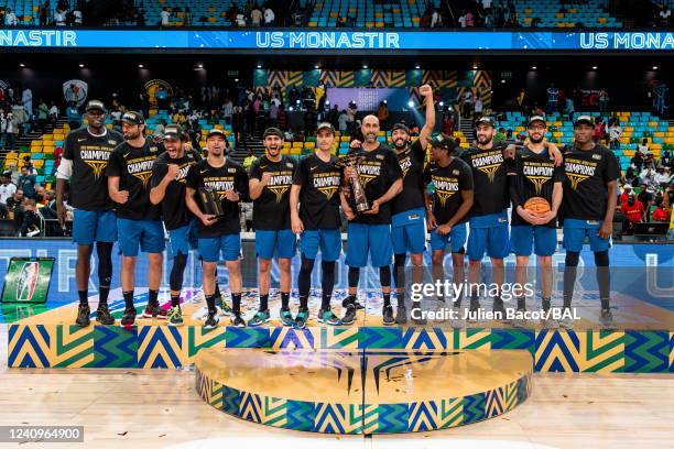 The US Monastir poses for a photo after winning the 2022 Basketball Africa League Championship after the game against the Clube Atlético Petroleos de...