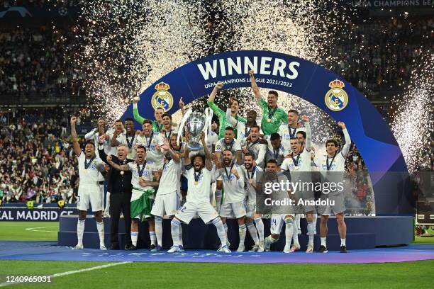 Players of Real Madrid celebrate with trophy after UEFA Champions League final match between Liverpool FC and Real Madrid at Stade de France in...