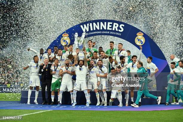 Players of Real Madrid celebrate with trophy after UEFA Champions League final match between Liverpool FC and Real Madrid at Stade de France in...