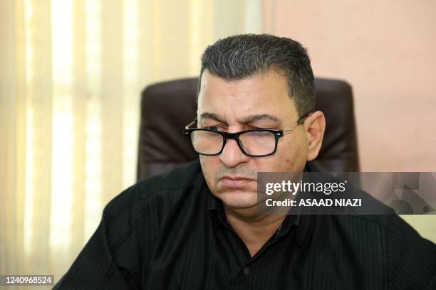 Haidar Hantouche, a local health official in Iraq's southern Dhi Qar province, is pictured during an interview with AFP in Iraq's Dhi Qar province,...