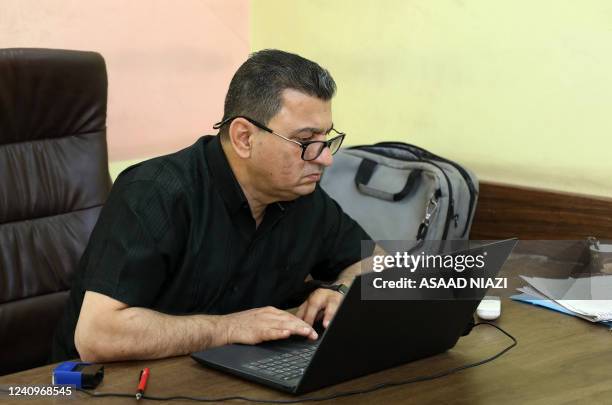Haidar Hantouche, a local health official in Iraq's southern Dhi Qar province, is pictured during an interview with AFP in Iraq's Dhi Qar province,...