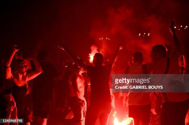 Real Madrid supporters celebrate in Cibeles square in downtown Madrid, at the end of the UEFA Champions League final football match between Liverpool...