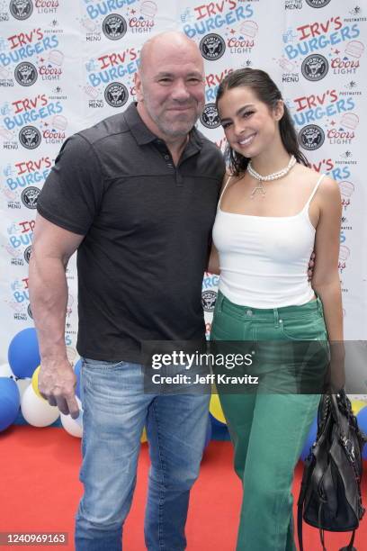 Dana White and Addison Rae celebrate National Burger Day at the friends and family preview party for the new Irv's Burgers on May 28, 2022 in Los...