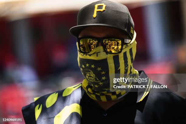 Counter protesters wearing the yellow and black colors and insignia of the Proud Boys gather outside the National Rifle Association Annual Meeting at...