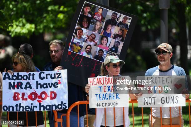 People protest in support of gun control outside the National Rifle Association annual meeting at the George R. Brown Convention Center in Houston,...