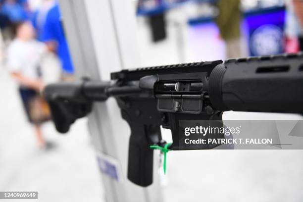 The receiver of an Smith & Wesson M&P-15 semi-automatic rifle of the AR-15 style is displayed during the National Rifle Association annual meeting at...