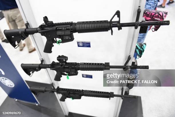 Smith & Wesson M&P-15 semi-automatic rifles of the AR-15 style are displayed during the National Rifle Association annual meeting at the George R....