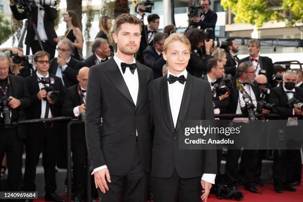 Belgian director Lukas Dhont and Belgian actor Eden Dambrine arrive for the Closing Ceremony of the 75th edition of the Cannes Film Festival in...