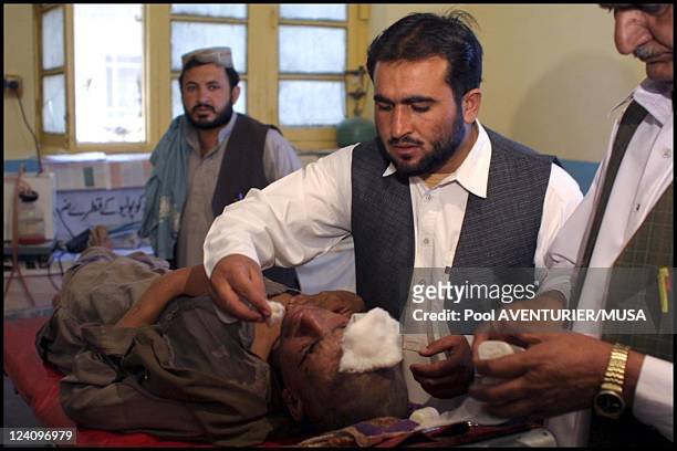 Wounded Afghans arriving from Kandahar at the Chaman Hospital In Chaman, Pakistan On October 18, 2001.