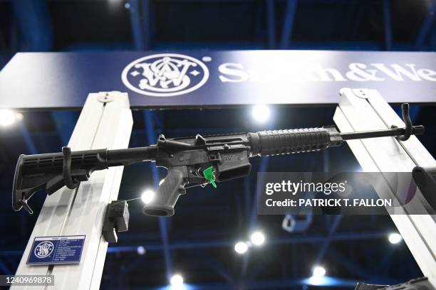 Smith & Wesson M&P-15 semi-automatic rifles of the AR-15 style are displayed during the National Rifle Association annual meeting at the George R....