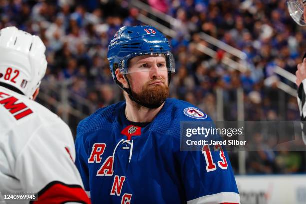 Alexis Lafrenière of the New York Rangers reacts to the linesman before a face-off during the third period against the Carolina Hurricanes in Game...