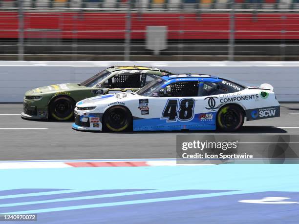 Austin Dillon and Myatt Snider race side by side during the running of the NASCAR Xfinity Series Alsco Uniforms 300 on May 28 at Charlotte Motor...