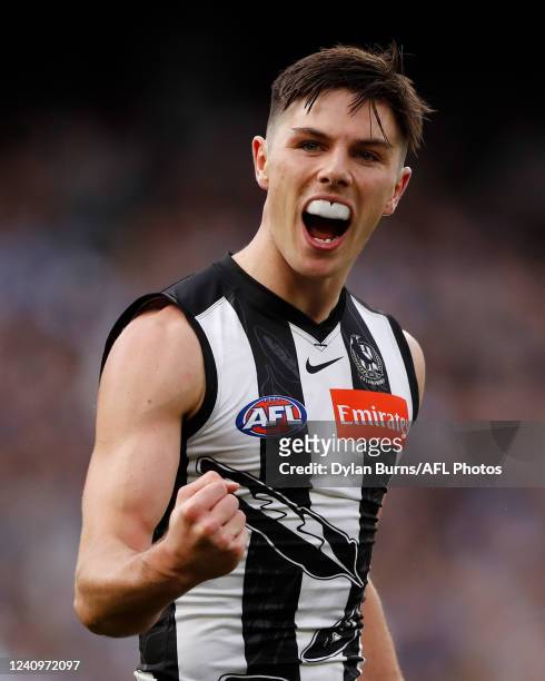 Oliver Henry of the Magpies celebrates a goal during the 2022 AFL Round 11 match between the Collingwood Magpies and the Carlton Blues at the...