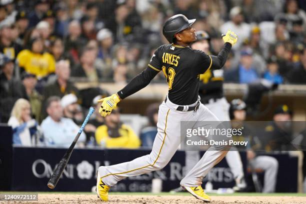Ke'Bryan Hayes of the Pittsburgh Pirates hits a three-run home run during the ninth inning of a baseball game against the San Diego Padres at Petco...