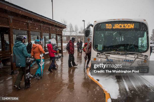 Skiers and snowboarders utilize the START bus at Jackson Hole Mountain Resort on Dec. 12, 2021 in Teton Village, Wyo.